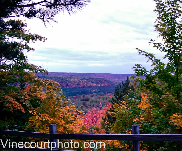 Autumn colors across the Jordan River Valley, seen from a wooded overlook